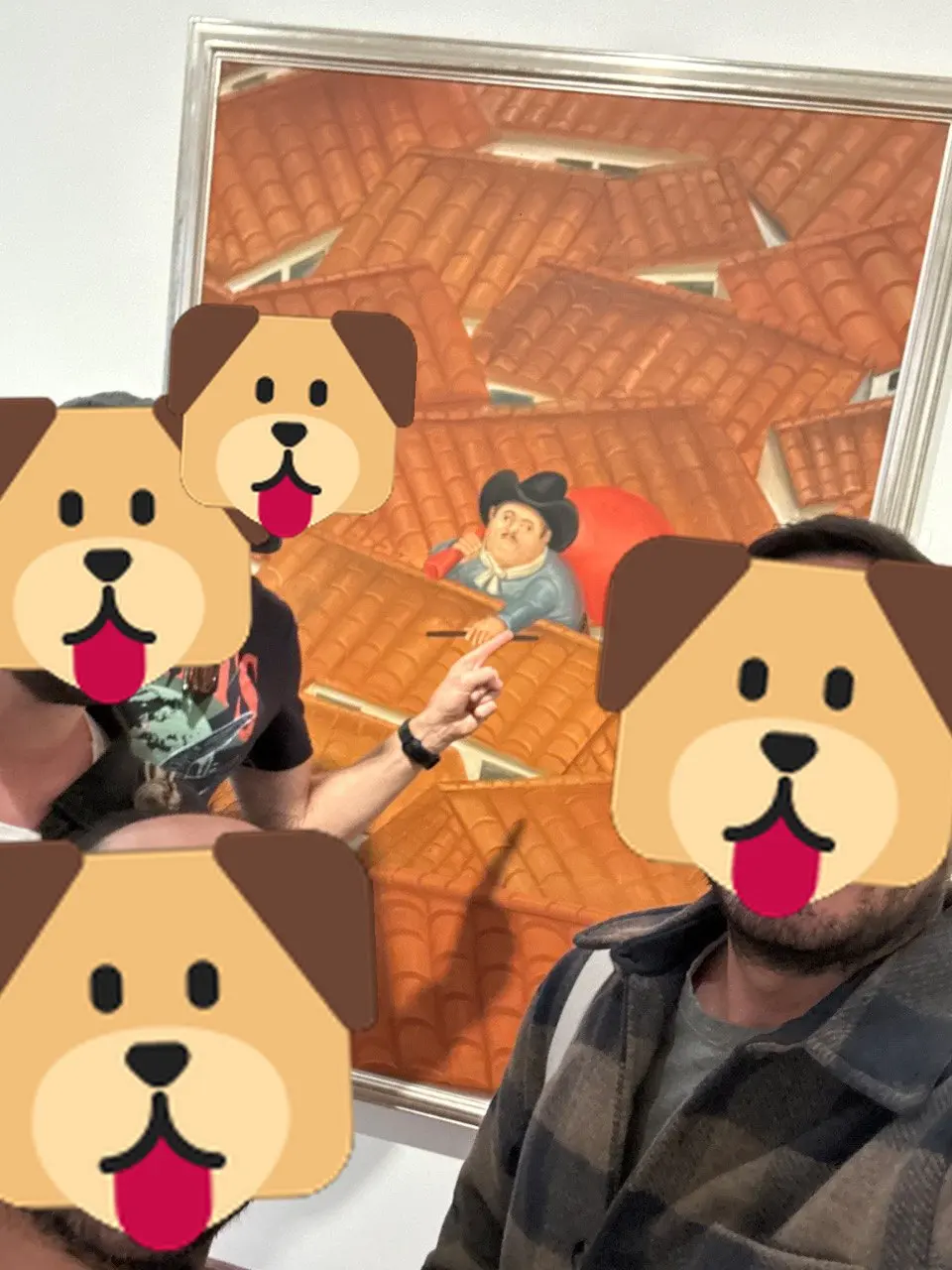 Lxs perritxs pointing at the Botero thief on the rooftop