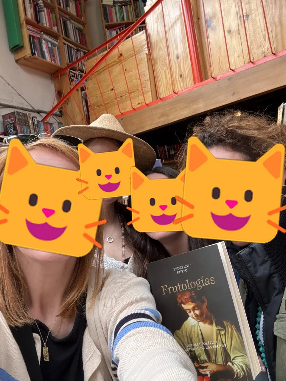 Las gatas inside Matorral with a book