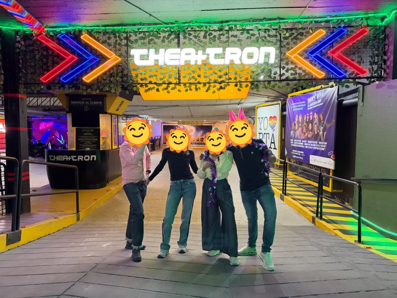 Los muiscas insurgentes under the neon Theatron sign